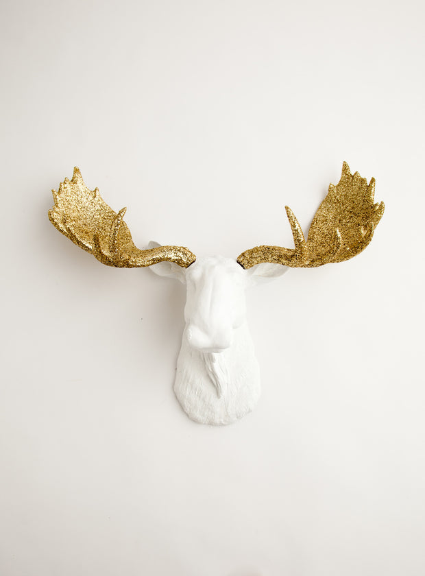 White faux moose head with gold glitter antlers